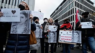 Protestors gather outside Poland's Constitutional Tribunal in Warsaw, Poland, on Nov .6, 2021, to protest against the restrictive abortion law.