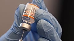 Paramedic Rebecca Hoke prepares a dose of the Pfizer-BioNTech COVID-19 vaccine in Fort Worth, Texas, Nov. 11, 2021.  