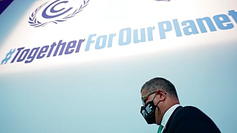 Alok Sharma, president of the COP26 summit, gets up after a stocktaking plenary session in Glasgow on November 13