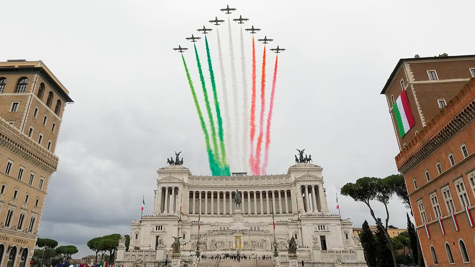 Italian Airforce acrobatic squad "Frecce Tricolori" fly above the Monument of the Unknown Soldier in Piazza Venezia Square, in Rome