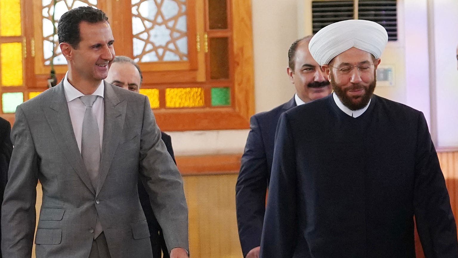 الرئيس السوري بشار الأسد ومفتي الجمهورية أحمد بدر الدين حسون.