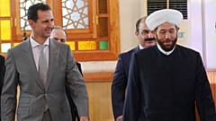 الرئيس السوري بشار الأسد ومفتي الجمهورية أحمد بدر الدين حسون.