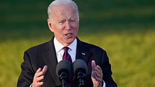 US President Joe Biden speaks before signing a bipartisan infrastructure bill into law on the South Lawn of the White House in Washington, Nov. 15, 2021.