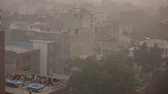 Morning haze and smog envelops the skyline in New Delhi, India, Friday, Nov. 5, 2021.