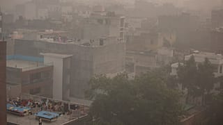 Morning haze and smog envelops the skyline in New Delhi, India, Friday, Nov. 5, 2021.