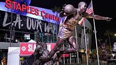 The statue of former Los Angeles Lakers Magic Johnson is seen in front of Staples Center.