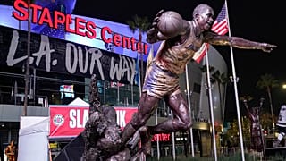 The statue of former Los Angeles Lakers Magic Johnson is seen in front of Staples Center.