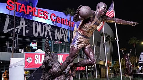 The statue of former Los Angeles Lakers Magic Johnson is seen in front of Staples Center.
