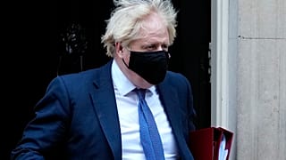 Britain's Prime Minister Boris Johnson leaves 10 Downing Street to attend the weekly sesion of Prime Ministers Questions at Parliament in London, Wednesday, Nov. 17, 2021.