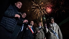 Mayor of Beaujeu Sylvain Sotton (C) takes part in the traditional event "the Sarmentelles" announcing the beginning of the "Beaujolais Nouveau" 2021 wine edition on 17/11/2021