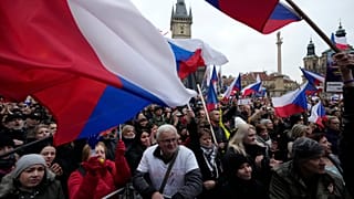 Demonstrators gather to protest against the COVID-19 restriction measures during celebrations of the 32nd anniversary of the Velvet Revolution in Prague, on Nov. 17, 2021.