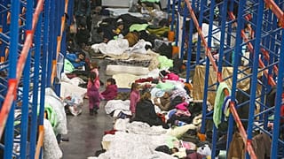 Migrantes iraquianos bloqueados na fronteira bielorussa repatriados