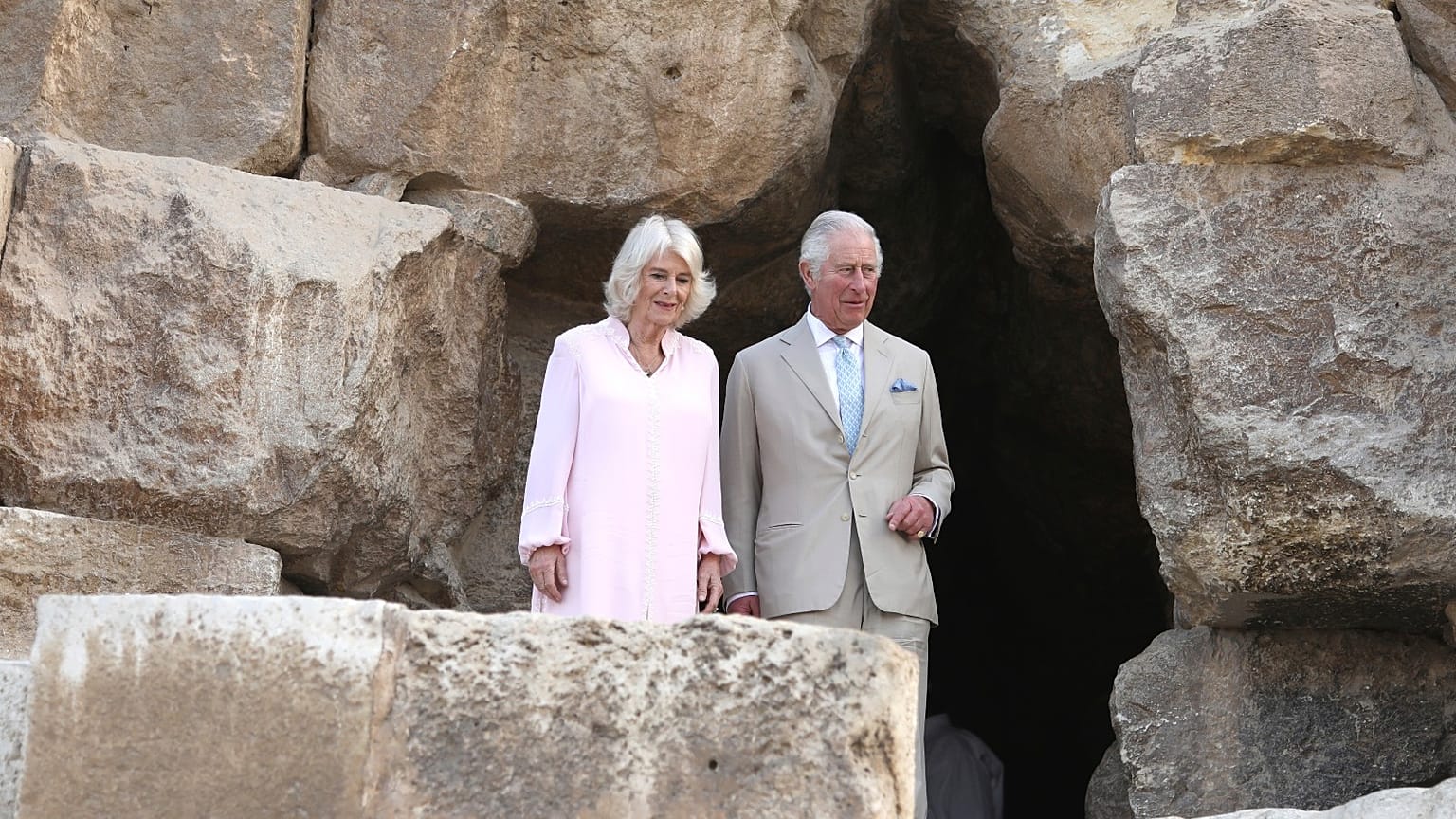 Britain's Prince Charles and his wife, Camilla visit the pyramids of Giza, on the edge of Cairo, Egypt, Thursday, Nov. 18, 2021. 