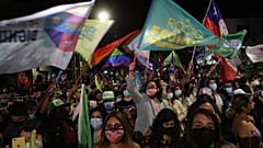 Supporters of presidential candidate Gabriel Boric gather at his headquarters after polls closed and partial results were announced in Santiago, Chile, on November 21, 2021. 
