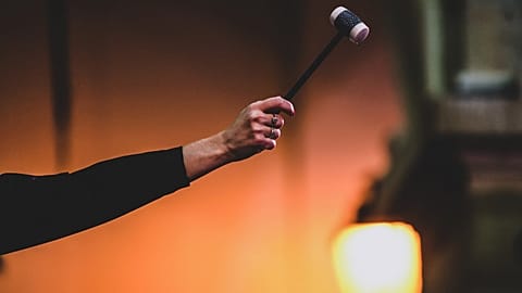 Auctioneer Aurelie Massou supervises the 161th charity wine action at the Hospices de Beaune, France, on November 21, 2021.