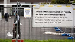 People exercise at a government managed isolation and quarantine (MIQ) facility in Auckland