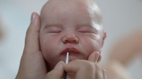 The fake baby that never sleeps, eats or cries