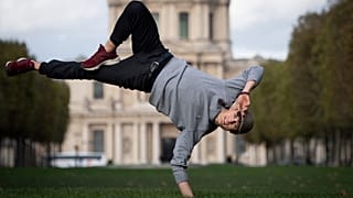 Polish opera singer and breakdancer Jakub Jozef Orlinski poses for pictures in front of the Invalides (Hotel des Invalides), on November 7, 2019 in Paris.