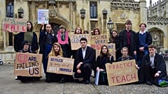 Cambridge University students present King's College with its 'U' grade on climate action.
