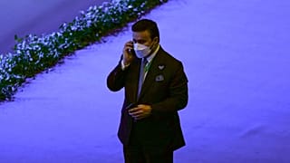 Maj. Gen. Ahmed Naser al-Raisi speaks on his cell phone during the first day of the Interpol annual assembly in Istanbul, Turkey, Tuesday, Nov. 23, 2021.