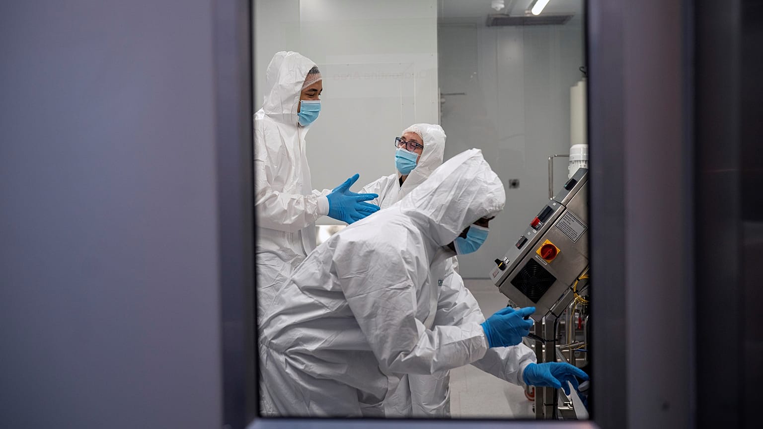 Scientists at work at a lab in South Africa, where a worrying new COVID variant has emerged
