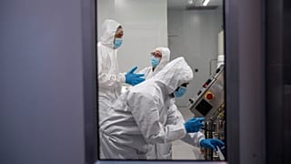 Scientists at work at a lab in South Africa, where a worrying new COVID variant has emerged