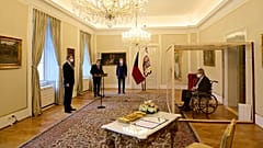 Czech President Milos Zeman, in a transparent cube because he tested positive to COVID-19, appoints Petr Fiala as Czech Prime Minister near Prague, 28 November, 2021. 
