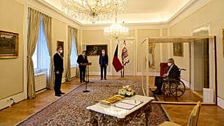 Czech President Milos Zeman, in a transparent cube because he tested positive to COVID-19, appoints Petr Fiala as Czech Prime Minister near Prague, 28 November, 2021. 