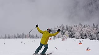 A tourist gestures while skiing, at Plan de Corones ski area, Italy South Tyrol, Nov. 27, 2021. 