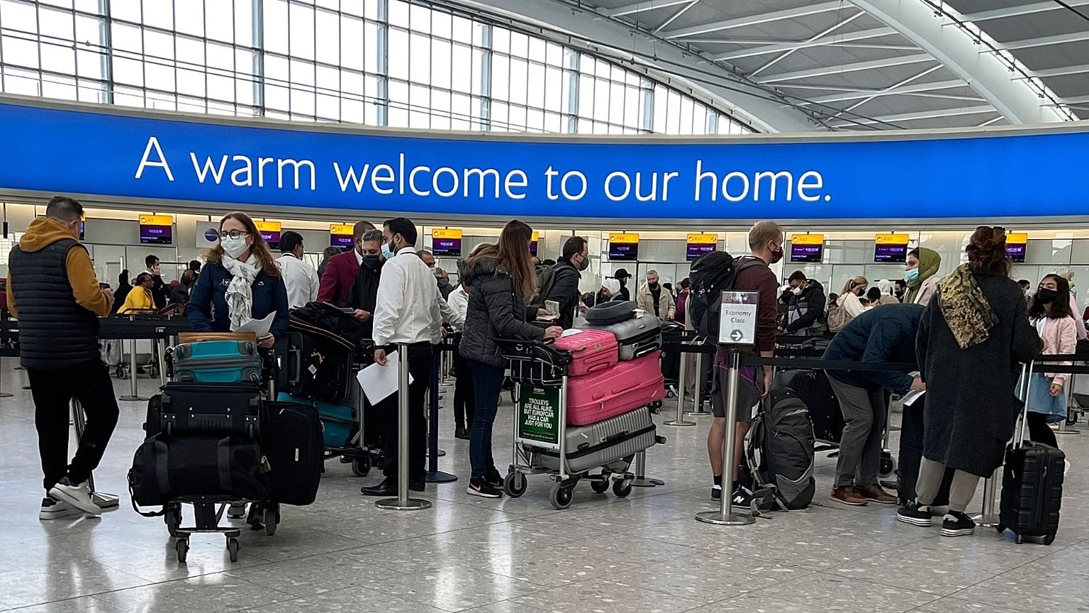 Passengers arriving back at Heathrow Airport today, 29 November.