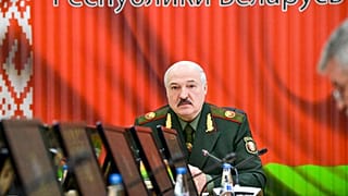 Belarusian President Alexander Lukashenko attends a meeting with top level military officials in Minsk, Belarus, Monday, Nov. 22, 2021. 
