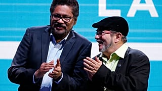 Лидеры РВСК Тимолеон Хименес (справа) и Иван Маркес на праздновании образования партии. 2017 год