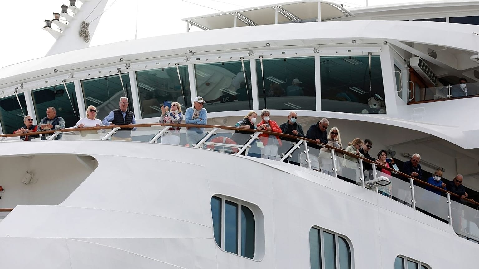 A luxury liner docked in Cape Town yesterday, as the WHO updated its travel advice.