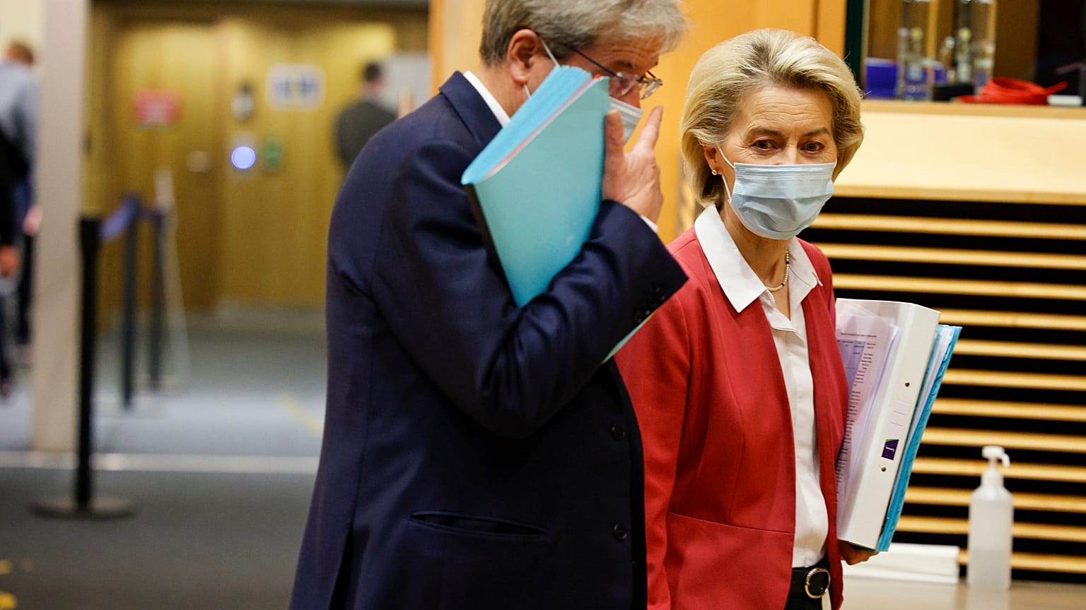 European Commissioner for Economics Paolo Gentiloni talks with President of the European Commission Ursula von der Leyen at the College of Commissioners in Brussels, Wednesday