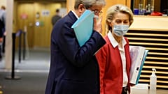European Commissioner for Economics Paolo Gentiloni talks with President of the European Commission Ursula von der Leyen at the College of Commissioners in Brussels, Wednesday