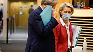 European Commissioner for Economics Paolo Gentiloni talks with President of the European Commission Ursula von der Leyen at the College of Commissioners in Brussels, Wednesday