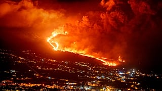 Lava flows as volcano continues to erupt on the Canary island of La Palma, Spain, Tuesday, Nov. 30, 2021
