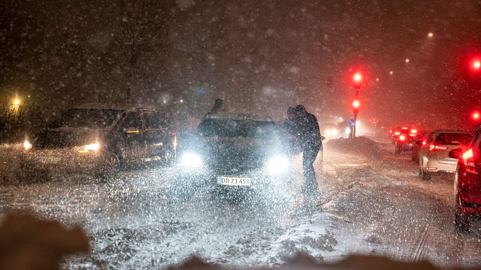 A snowstorm causes chaos on the roads around Aalborg.