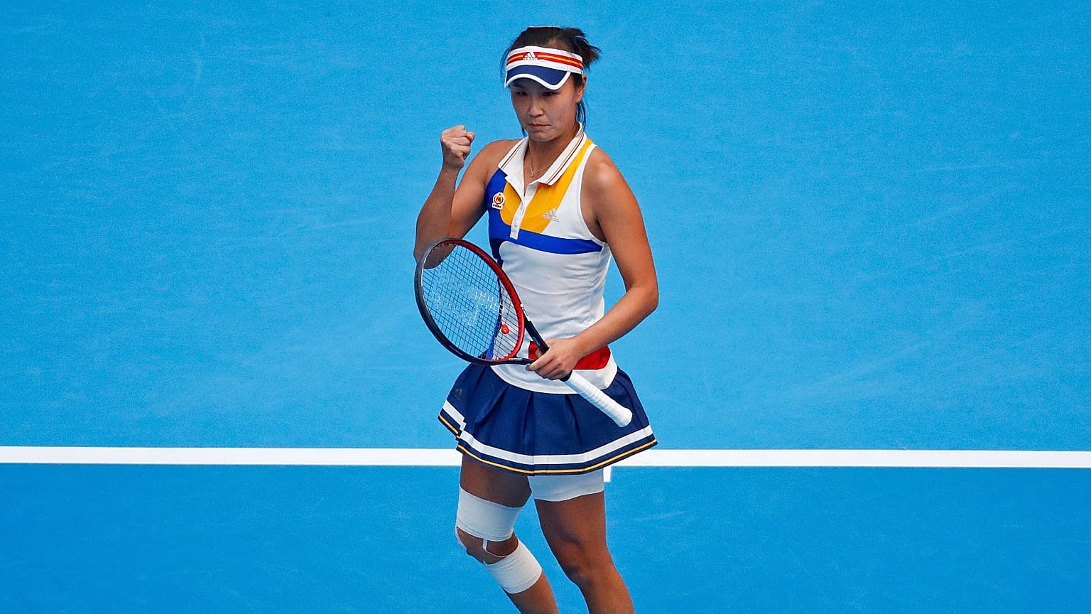 FILE - Peng Shuai of China reacts after scoring a point against Monica Niculescu of Romania during their women's singles match of the China Open tennis tournament.