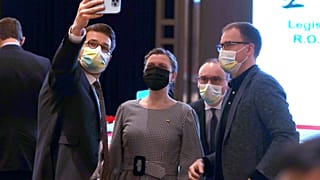 Matas Maldeikis, second from right, poses for a photo with group members before the 2021 Open Parliament Forum in Taiwan.