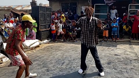 In poor Lagos district, 'slum party' brings hope and life