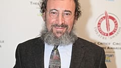 Antony Sher poses for photographers after winning the best Shakespearean performance award at the Critics' Circle Theatre Awards in central London Jan. 27, 2015