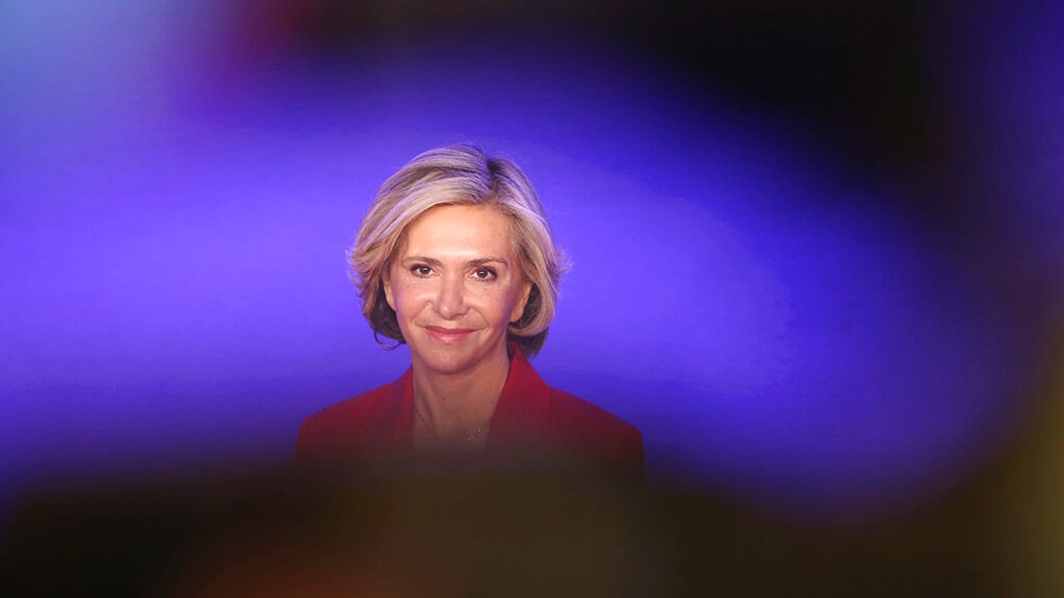 Valérie Pécresse smiles at the Conservative party Les Republicains party headquarters after being elected as the party's presidential candidate, Saturday, Dec. 4, 2021. 