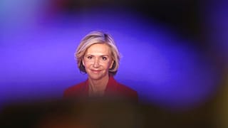 Valérie Pécresse smiles at the Conservative party Les Republicains party headquarters after being elected as the party's presidential candidate, Saturday, Dec. 4, 2021.