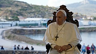 Pope Francis attends a ceremony at the Karatepe refugee camp, on the northeastern Aegean island of Lesbos, Greece, Sunday, Dec. 5, 2021