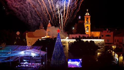 Famed Manger Square Christmas tree lit up