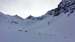 FILE: Mountain rescue service personnel search for skiers who were trapped in an avalanche in a valley of the Tyrolian municipality of Wattenberg, Austria, Feb. 6, 2016