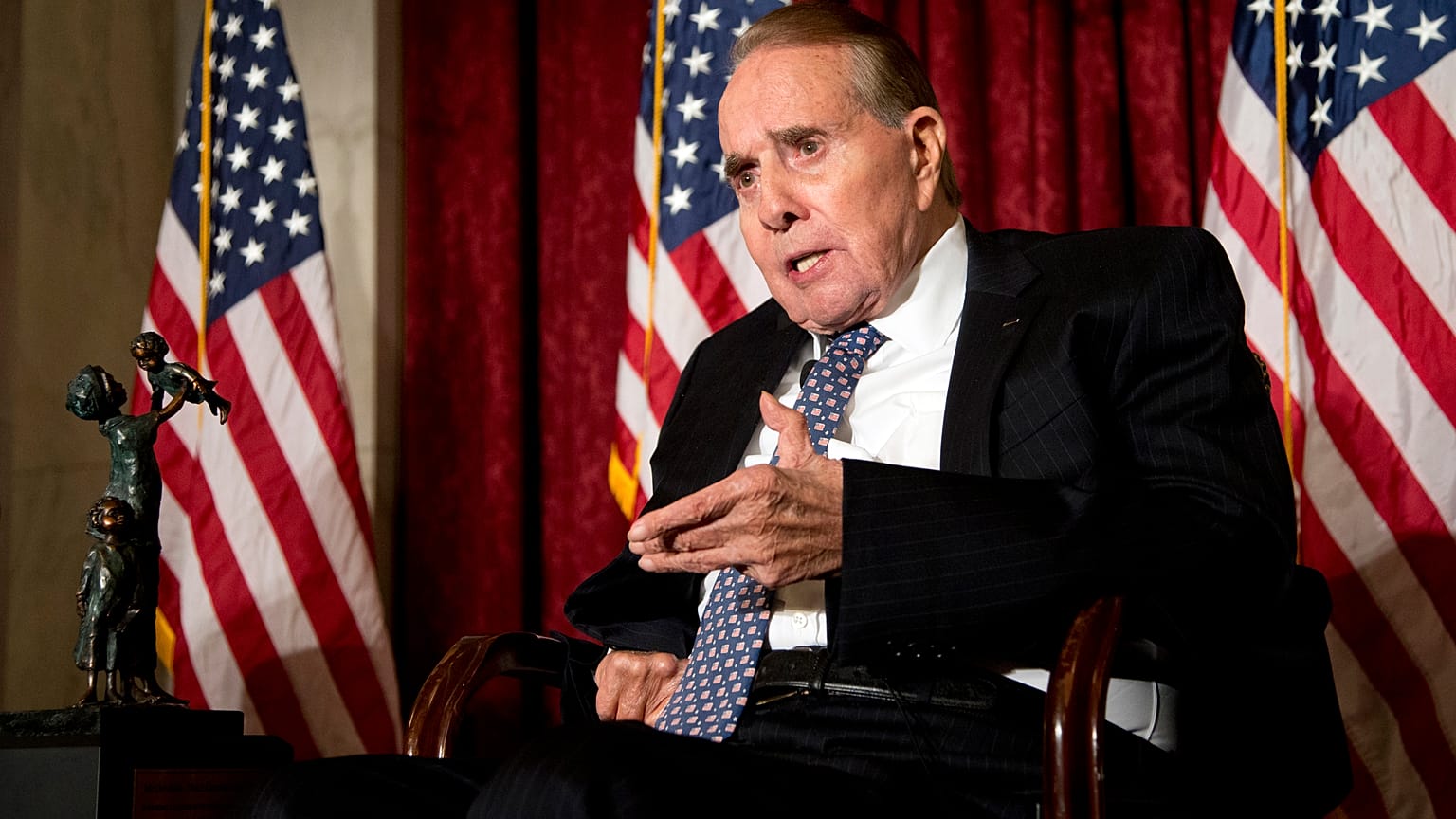 Former Senate Majority Leader Bob Dole speaks after being presented with the McGovern-Dole Leadership Award, on Capitol Hill in Washington, Dec. 11, 2013.