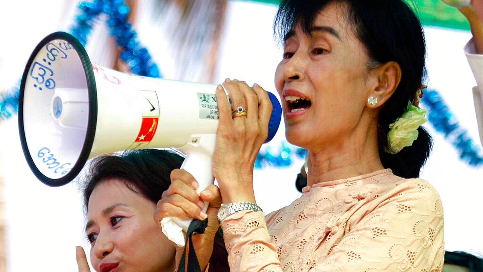 Myanmar pro-democracy icon Aung San Suu Kyi speaks to her supporters during her election campaign in Myeik, Myanmar on March 24, 2012.
