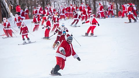 Skiers and snowboarders hit the slopes at Sunday River Ski Resort